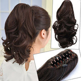 short to mid length claw flowing clip in ponytail