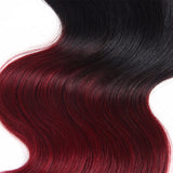 ombre black to vibrant red hair